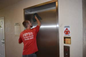 Cleaning outer door of Elevator