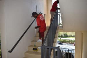 Mike Sweeping Stairs